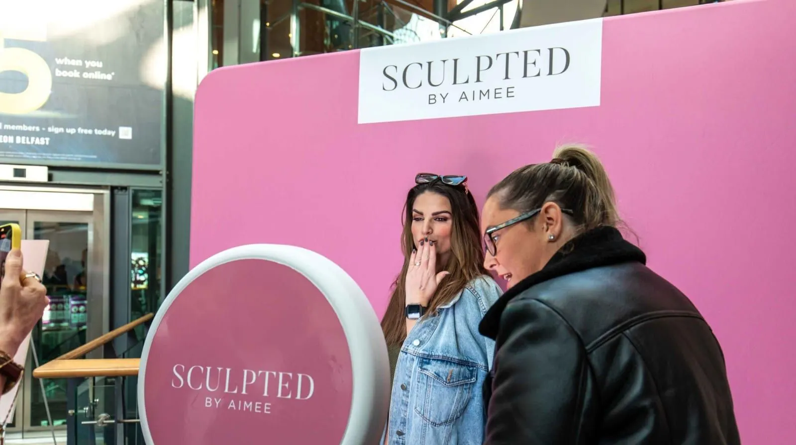 A fully wrapped branded photo booth at a corporate brand activation