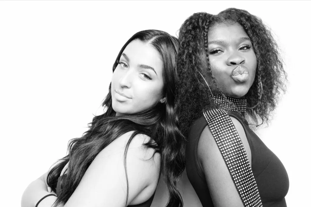 Black and white glam booth portrait of guests